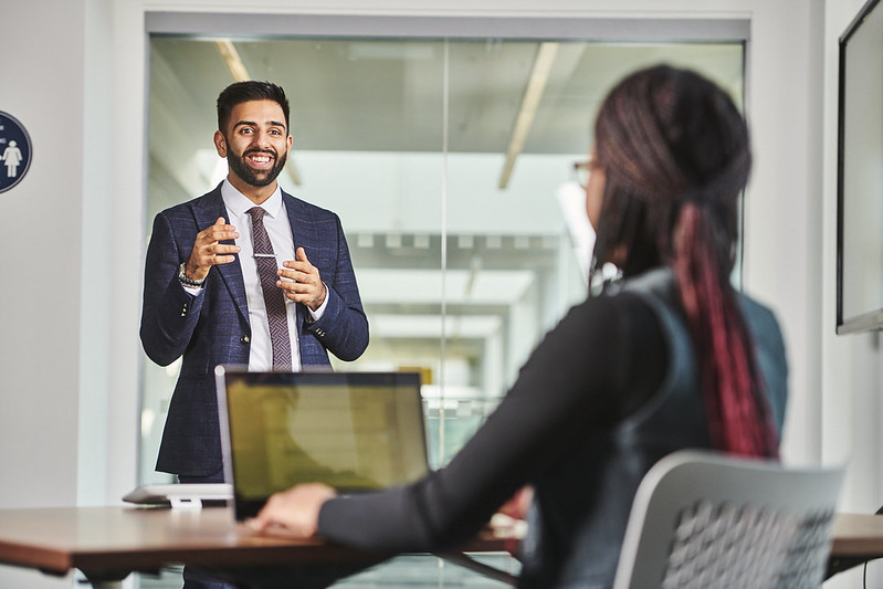 Student stood presenting talk
