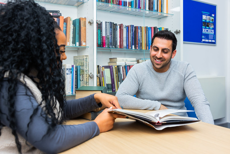 Postgraduate students in discussion at the University of Wolverhampton