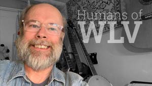 David Matheson on a black and white background of a room with many musical instruments, white text reading Humans of WLV