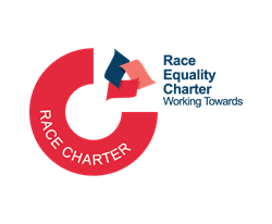 Logo for the Race Equality Charter, three coloured shapes forming a triangle at the edge of a red circle, text next to the shapes reading RACE EQUALITY CHARTER - WORKING TOWARDS.