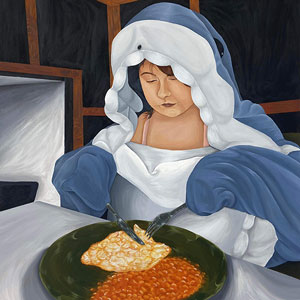 A person sitting at a table with their chair turned backwards, eating an omelette and baked beans while wearing a shark onesie.