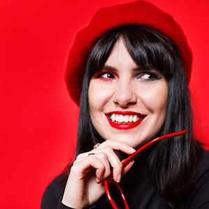 Portrait of Photography graduate, Brodie Weatherill she is smiling