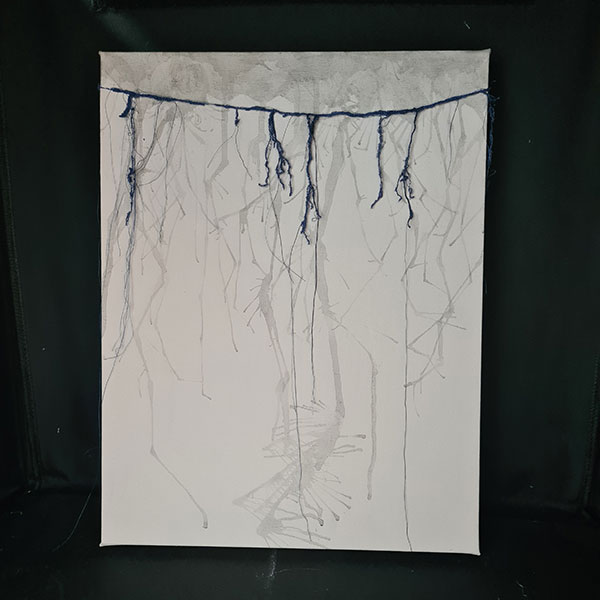 Image showing a large white sheet of paper with a light grey sketched out drawing that resembles a tress root network with some dark blue/purple string in the top half of the image