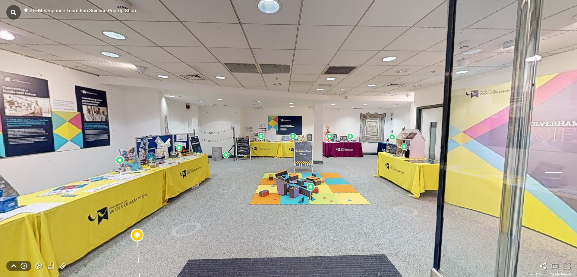 A still taken from a matterport of a STEM pop up shop in the mander centre where you can see a variety of hands-on interactive stem activities.