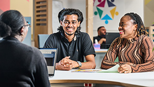Students talking with a student advisor