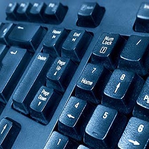 Close-up photograph of keys on a black computer keyboard