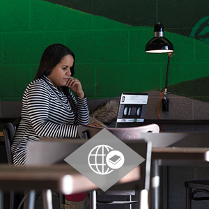 A student studying on a laptop