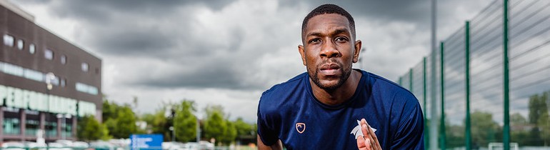 Student running track